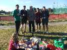 The whole team enjoying a picnic at the finish