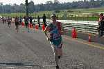 Chris crossing the finish line