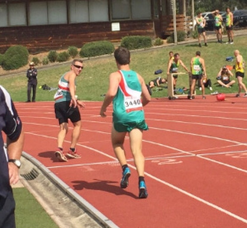 Phil handing the baton to John (4x400m Relay)