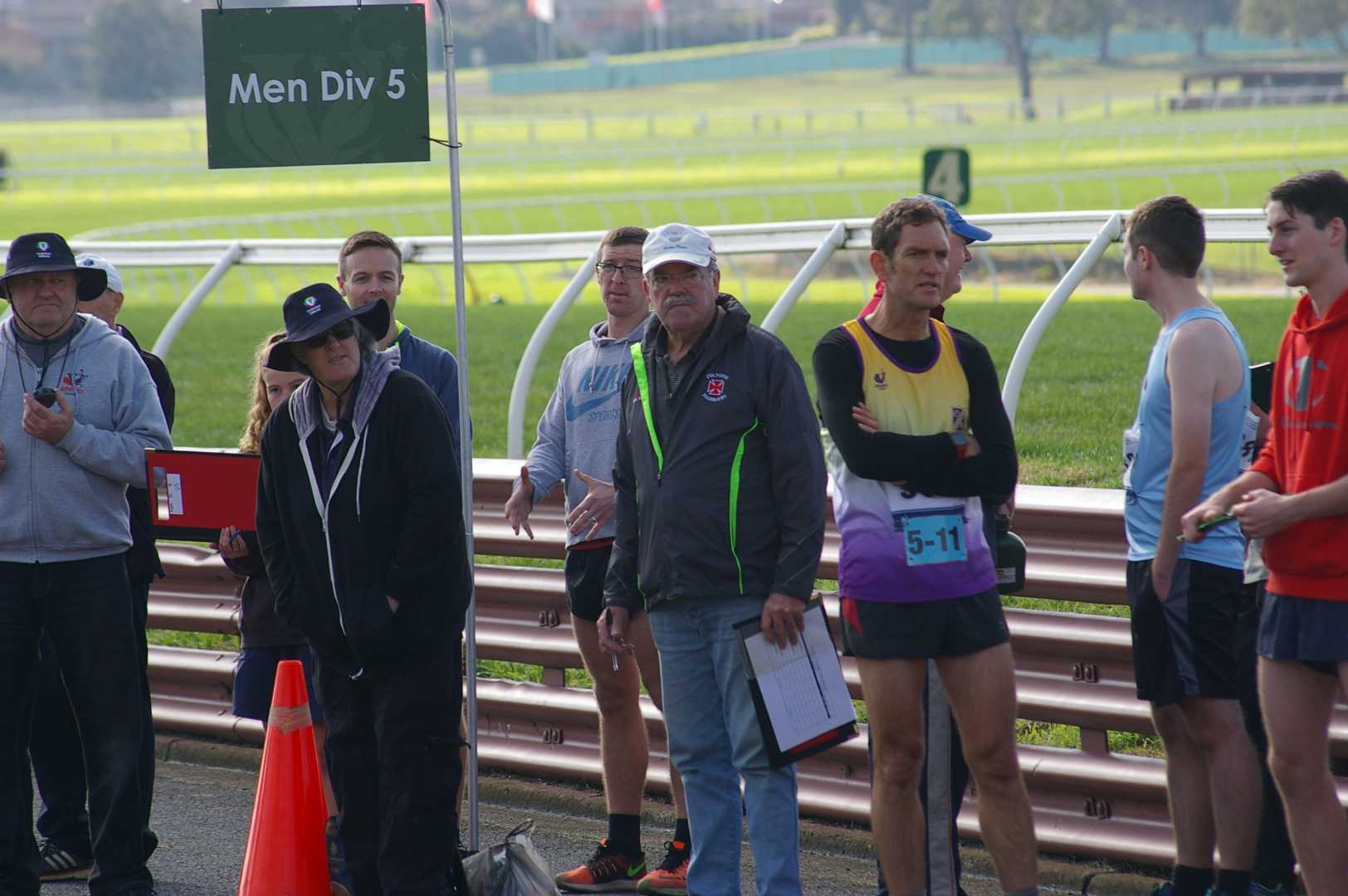 Our Club President Jeff as the official recorder of team times for Division 5 Men