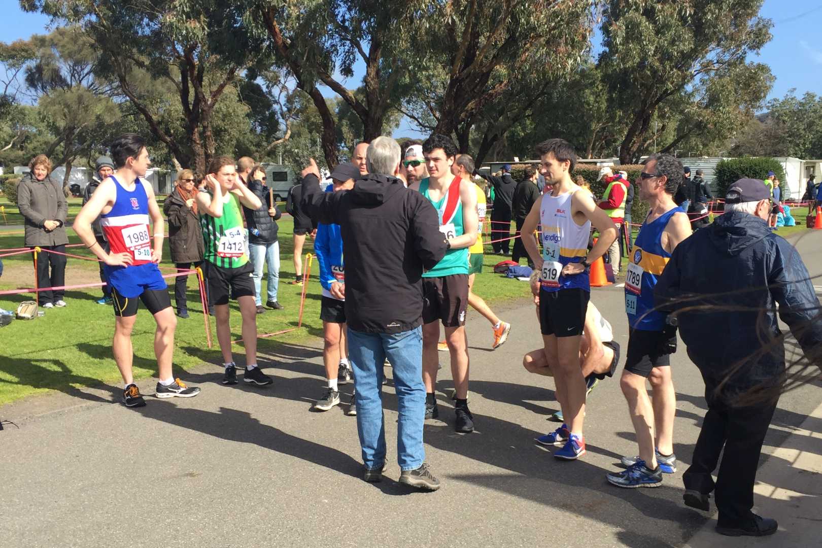 Tom listening to the pre-race instructions from an official