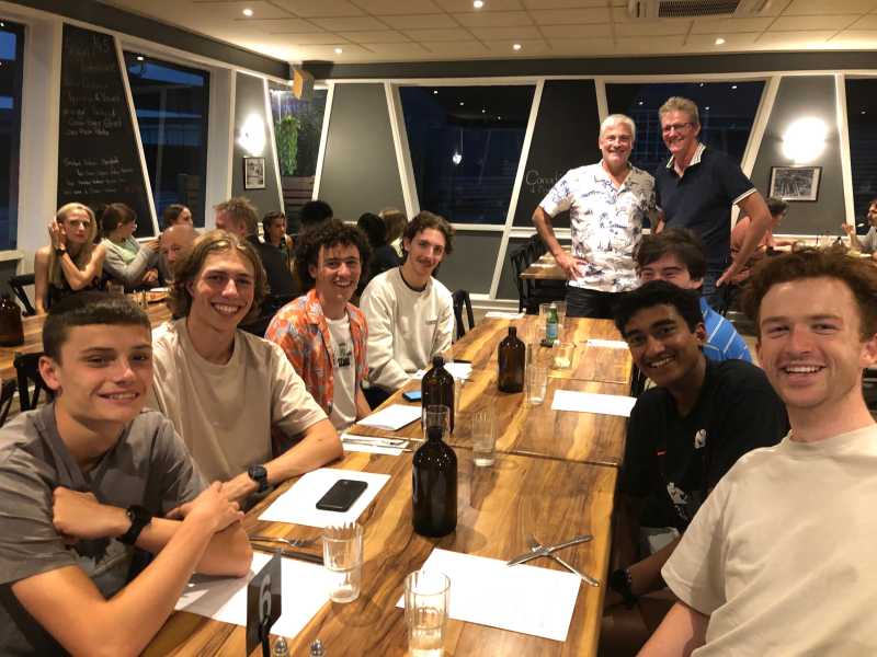 Members of the Club sitting around a resturant table