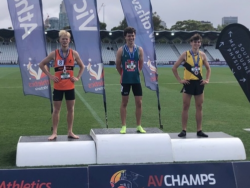 Jamie on top of the dais after receiving his medal